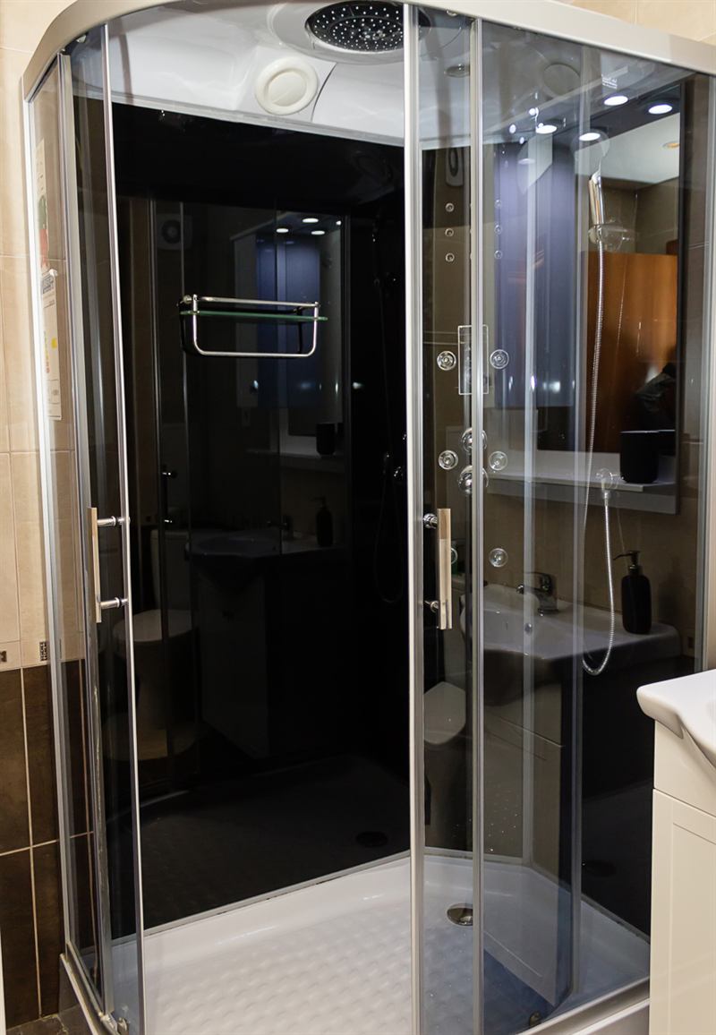 Modern bathroom with steam-shower cabin