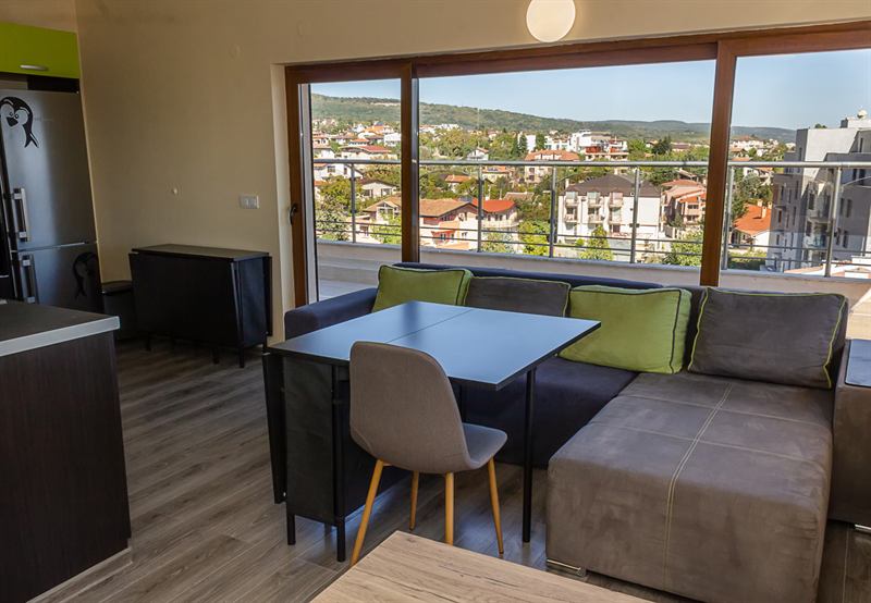 Living and dining area with panoramic sea view